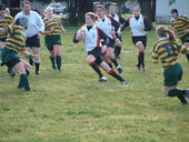 Kim playing rugby